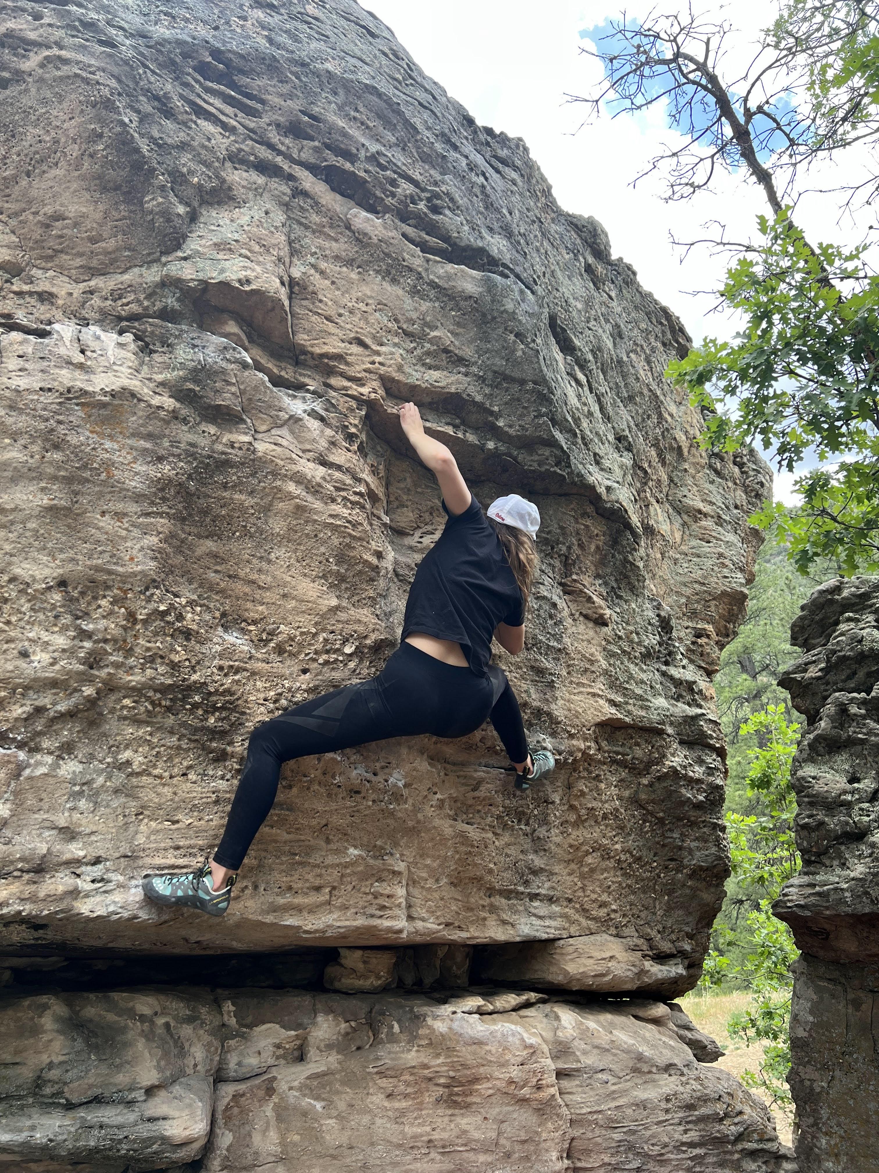 /images/claire-smashing-boulder.jpg